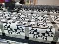 King-sized quilt with geometric quilting design King-sized quilt with geometric quilting design